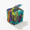 Close-up detail of Patient Shadow silk furoshiki wrap by Essery Waller, showing texture and Voice collection artwork design