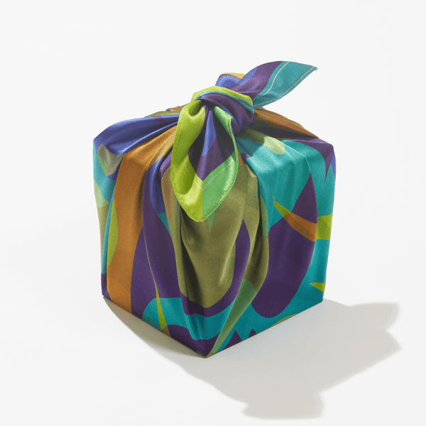 Close-up detail of Patient Shadow silk furoshiki wrap by Essery Waller, showing texture and Voice collection artwork design