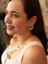 Fair Anita peach and blue butterfly earrings displayed flat, showing beaded detail