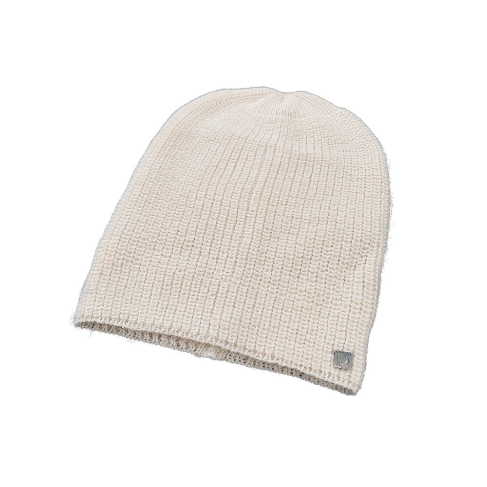 Pearl white baby alpaca beanie hat styled on model, side view