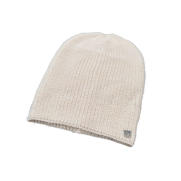 Pearl white baby alpaca beanie hat styled on model, side view