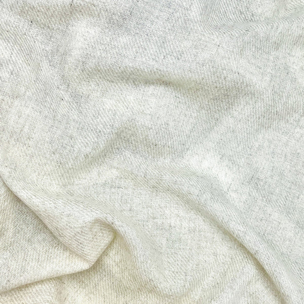 Close-up of beige cashemere with a soft texture