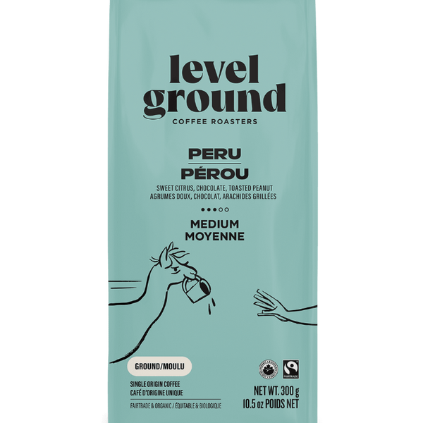 Close-up of Ethical Trade Co Peruvian medium roast coffee packaging showing single origin and organic certifications