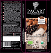 Pacari chocolate packaging with a wooden spoon and cacao beans