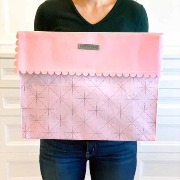 EverEnvelope pink reusable gift bag laid flat showing foldable design