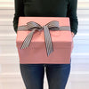 EverBox pink eco-friendly gift box folded flat for compact, clutter-free storage