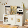 Tiny Land cream wooden play kitchen set with gold accents displayed in a styled children's room