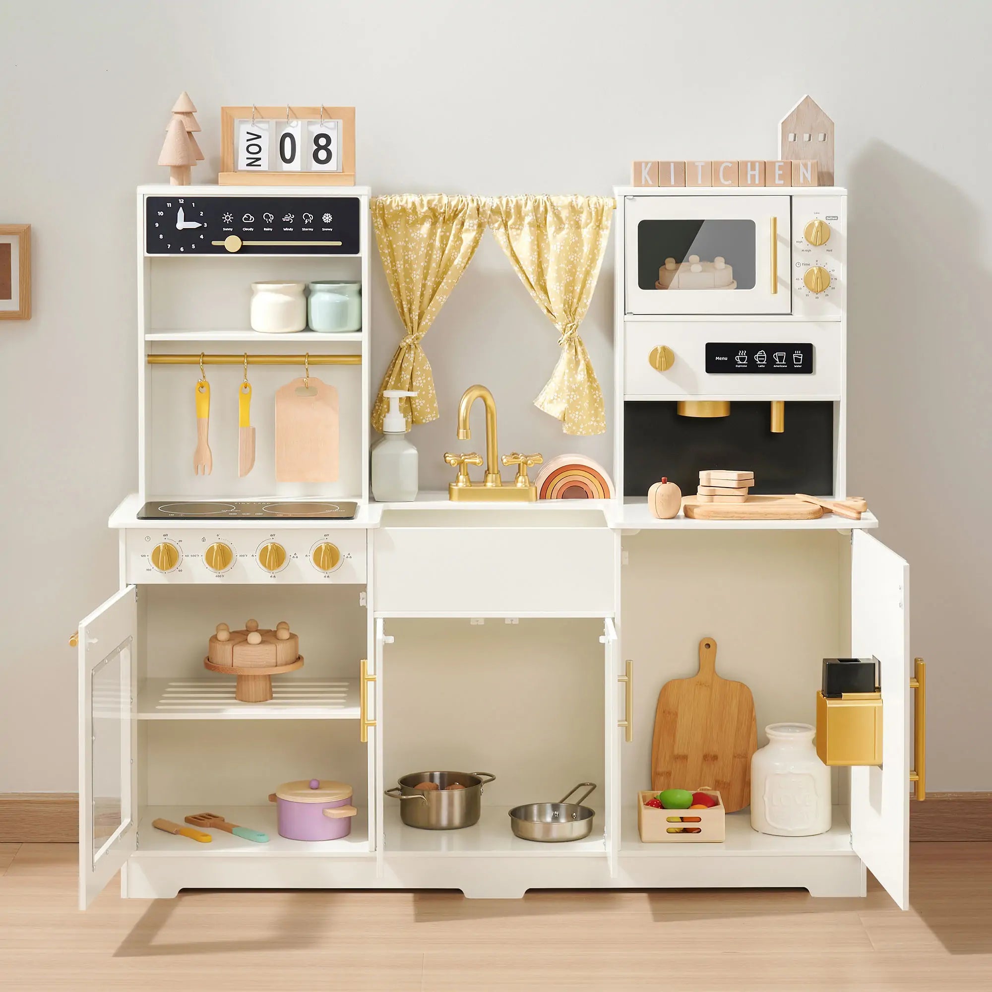 Close-up detail of the Tiny Land wooden play kitchen showing click-clack knobs, sink and utensil rack
