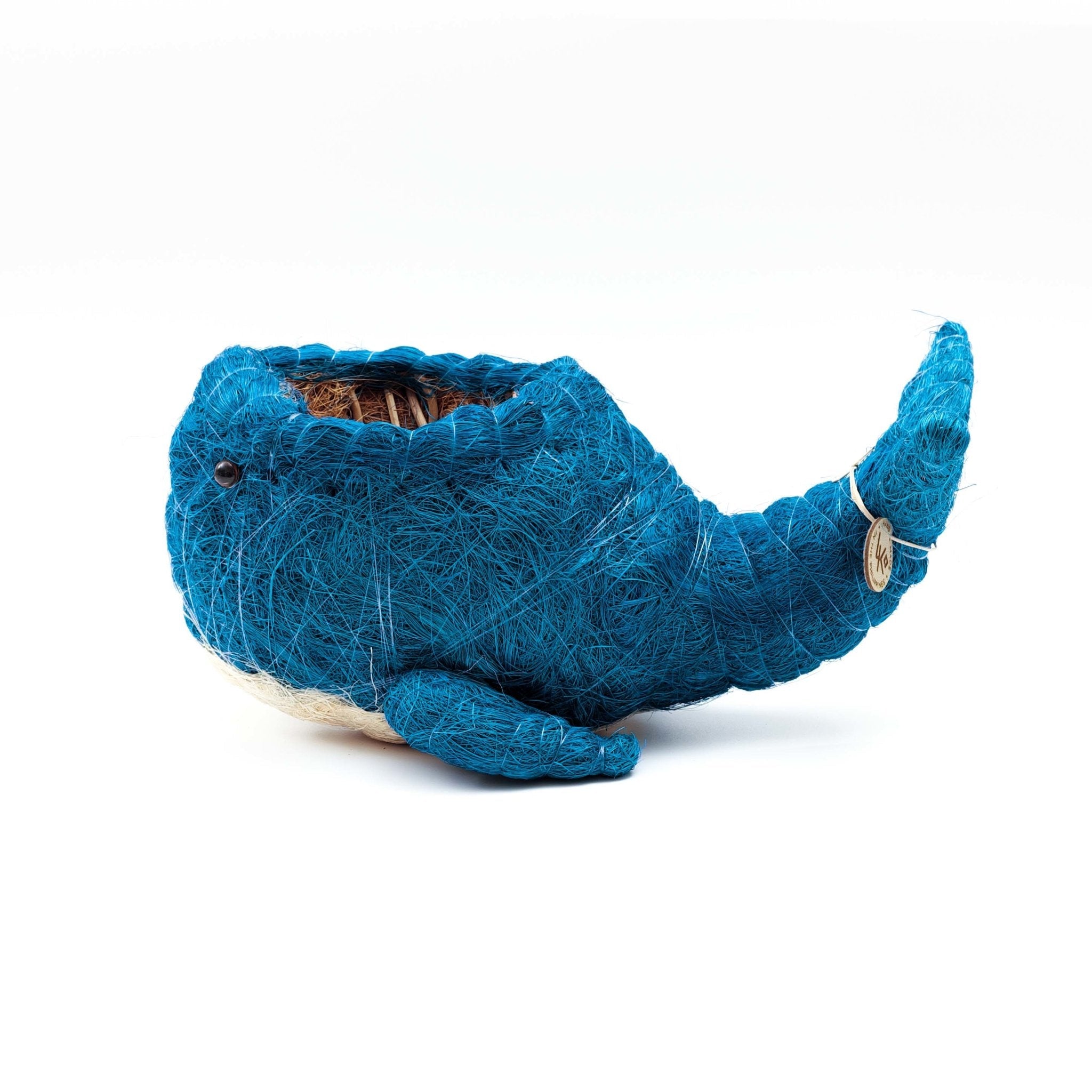 Blue whale-shaped cat toy on a white background