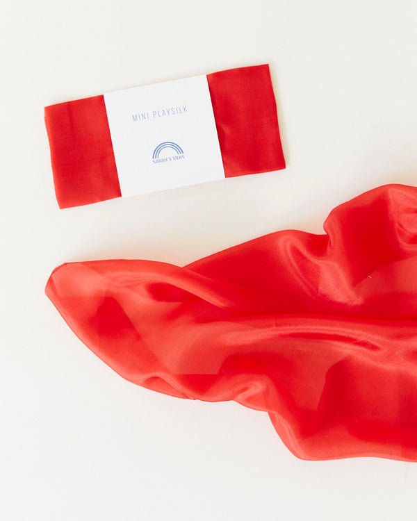Sarah's Silks Mini Playsilk Set displayed in a basket — a colourful, eco-friendly gift for kids