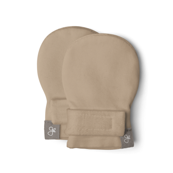 Pair of beige knee pads with a brand tag on a transparent background