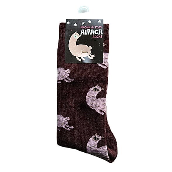 Alpaca socks with a branded tag on a white background. Discover our fun Pronk & Play Alpaca Socks, featuring a cheerful design for adults and kids. Made with a soft alpaca blend, these USA-designed socks are comfortable and durable. Shop now and add a little joy to your step.