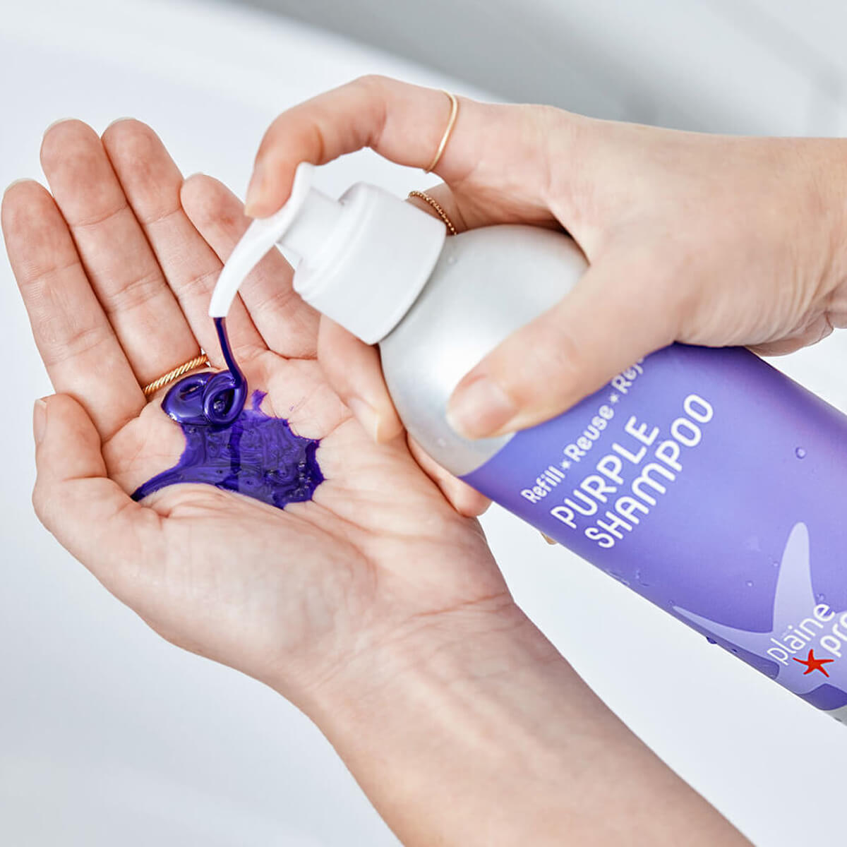 Plaine Products Purple Shampoo refillable bottle with pump dispenser