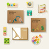 Collection of Tiny Land Montessori educational toys and play boxes on a white background