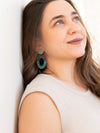 Blue raffia loop earrings by Fair Anita laying flat, 2.5 inch drop, sustainable and ethically made