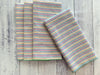 Rainbow seersucker dinner napkins, 20-inch size, cotton poly blend, set of four