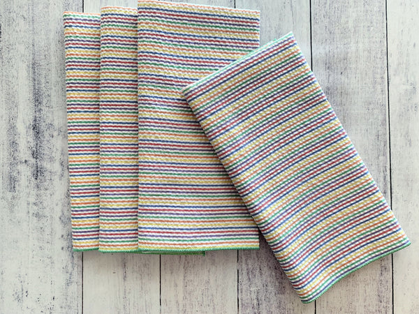 Rainbow seersucker dinner napkins, 20-inch size, cotton poly blend, set of four