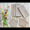 Set of four rainbow stripe seersucker cloth napkins by Dot and Army, made in Georgia