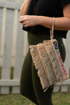 Recycled Fringe Clutch showing fringe detailing and interior
