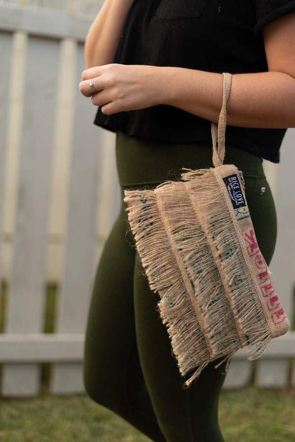 Recycled Fringe Clutch showing fringe detailing and interior