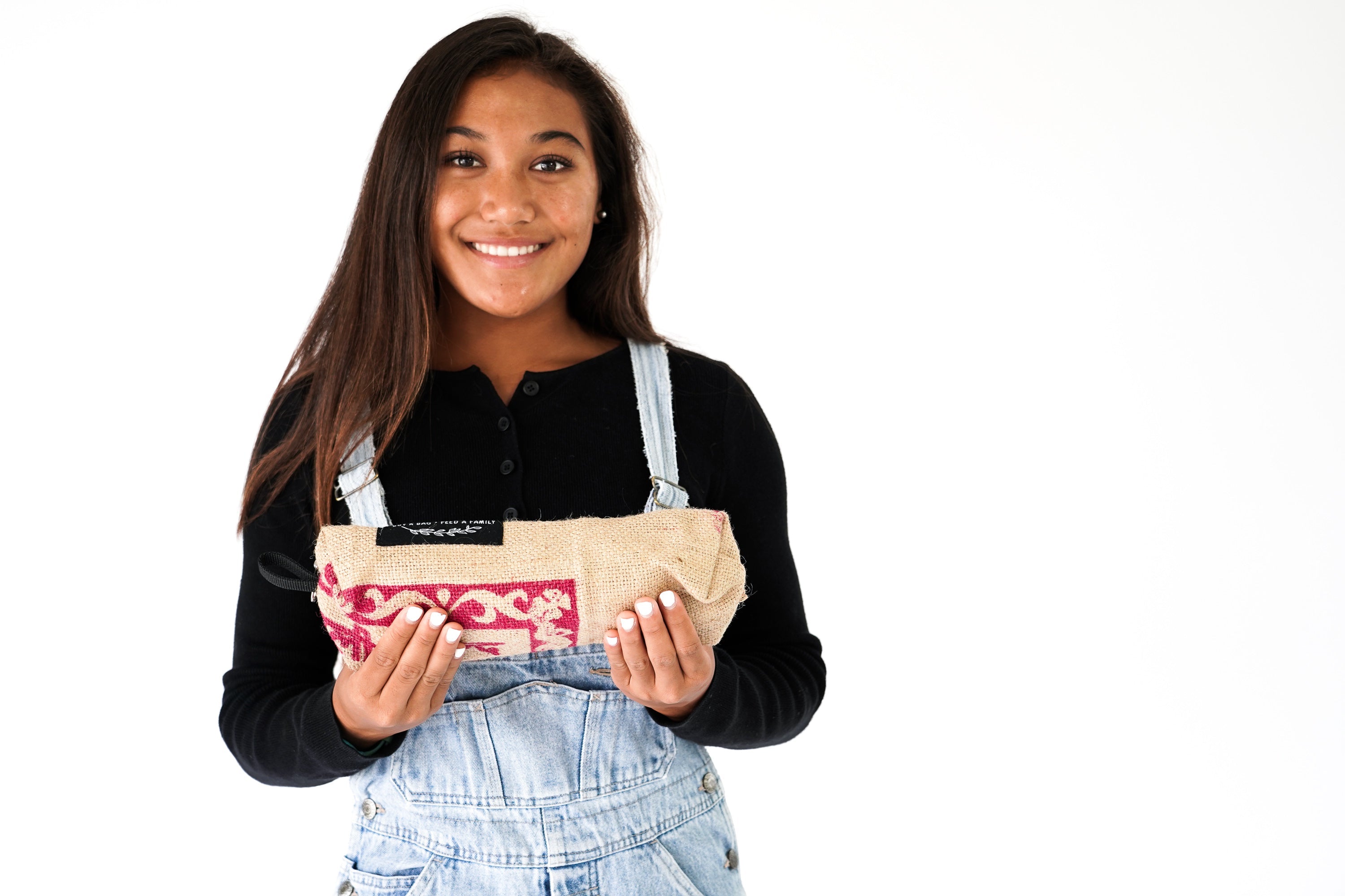 Recycled Zipper Pouch displayed to show size for holding pens and small essentials
