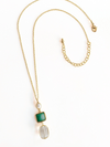 Regency Drop Pendant Necklace flat lay showing gold pendant and chain detail