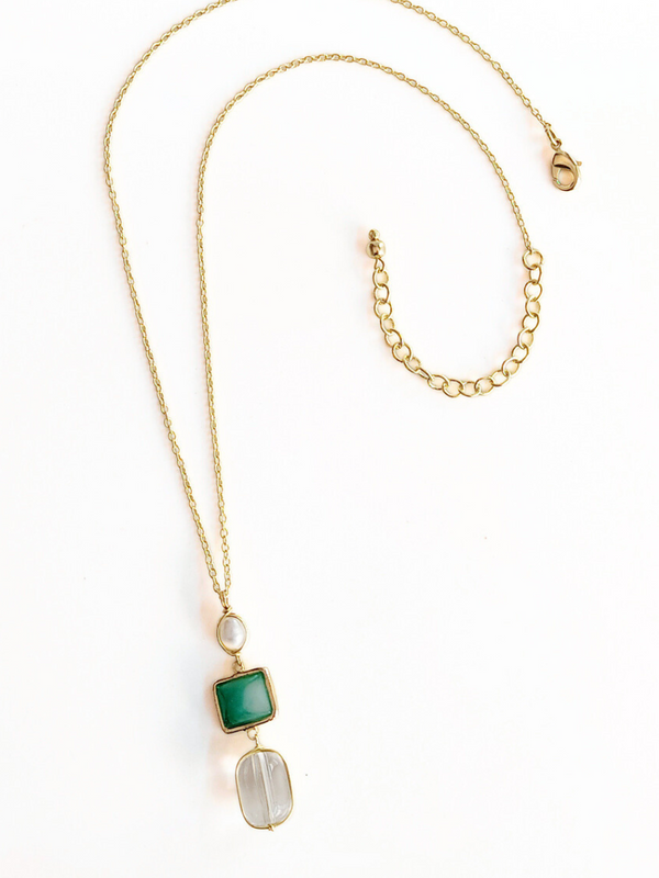 Regency Drop Pendant Necklace flat lay showing gold pendant and chain detail