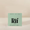 Box of Rif Care regular absorbency pads on a beige background