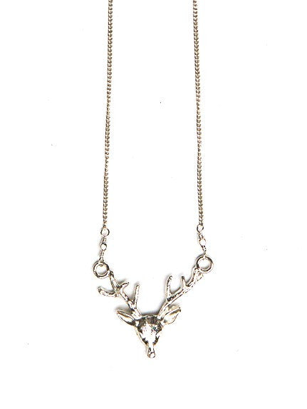 Silver fair trade deer antler necklace close-up detail shot