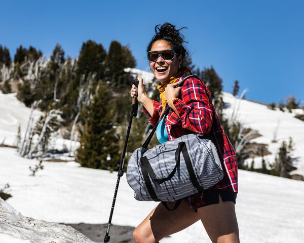 The Retro Duffel is the perfect blend of style and sustainability. Made from recycled materials and featuring a spacious design, this bag is ideal for travel, gym workouts, or everyday use. Experience the perfect combination of vintage style and modern practicality. Order yours today!