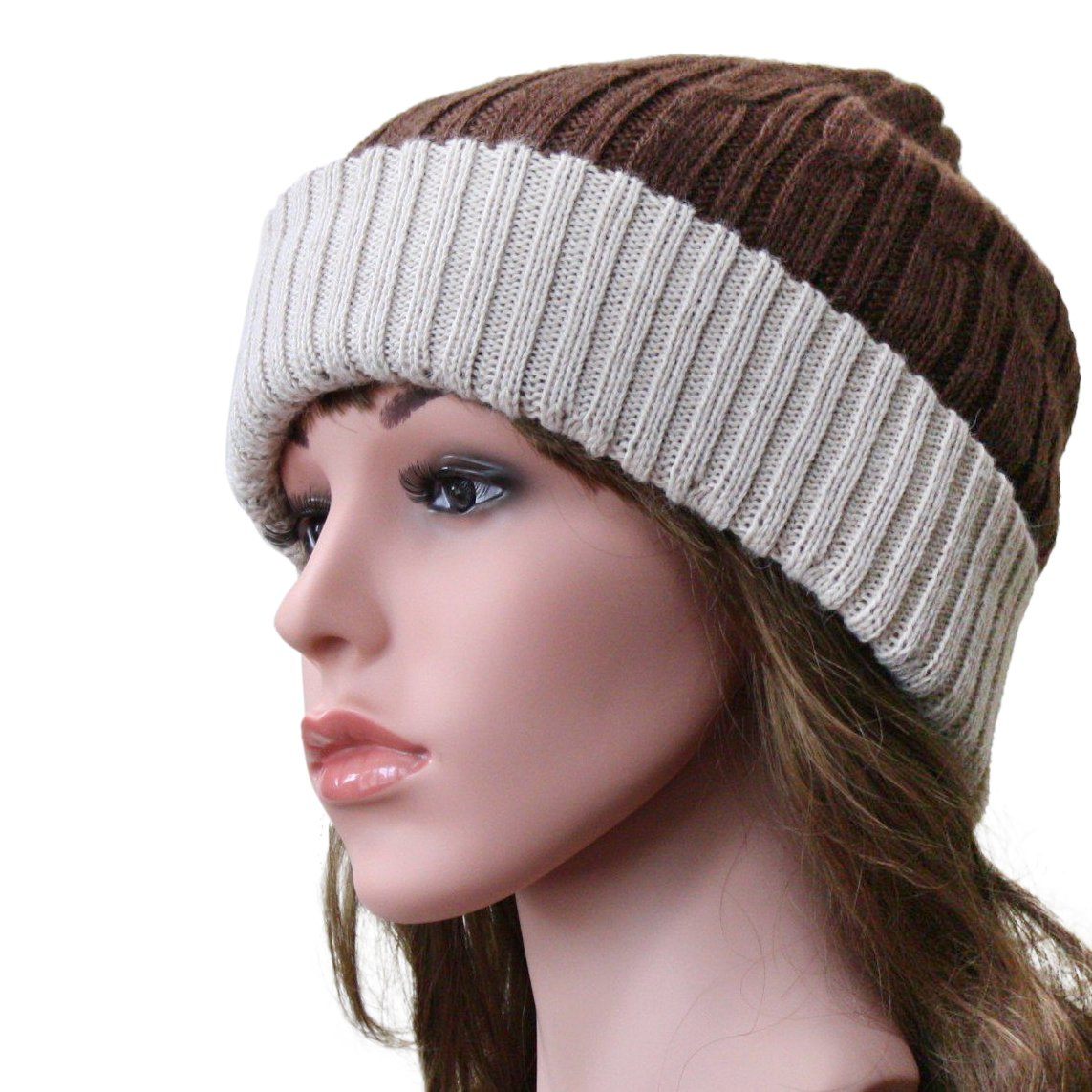 Mannequin head wearing a brown and beige striped knit beanie on a white background