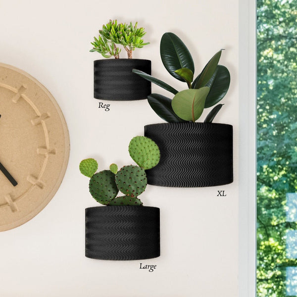 Eco-chic meets plant love! Ripple Wall Planter is 3D printed with bioplastic & has superior drainage. Shop modern, sustainable planters in various sizes & colors!