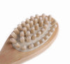 Wooden brush with soft bristles on a white background