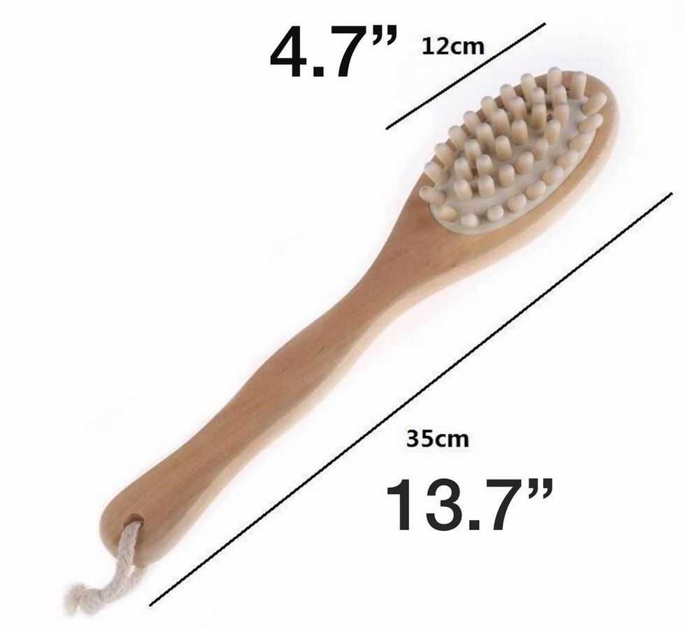 Wooden brush with measurements on a white background