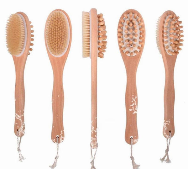 Set of five wooden brushes with bristle heads on a white background