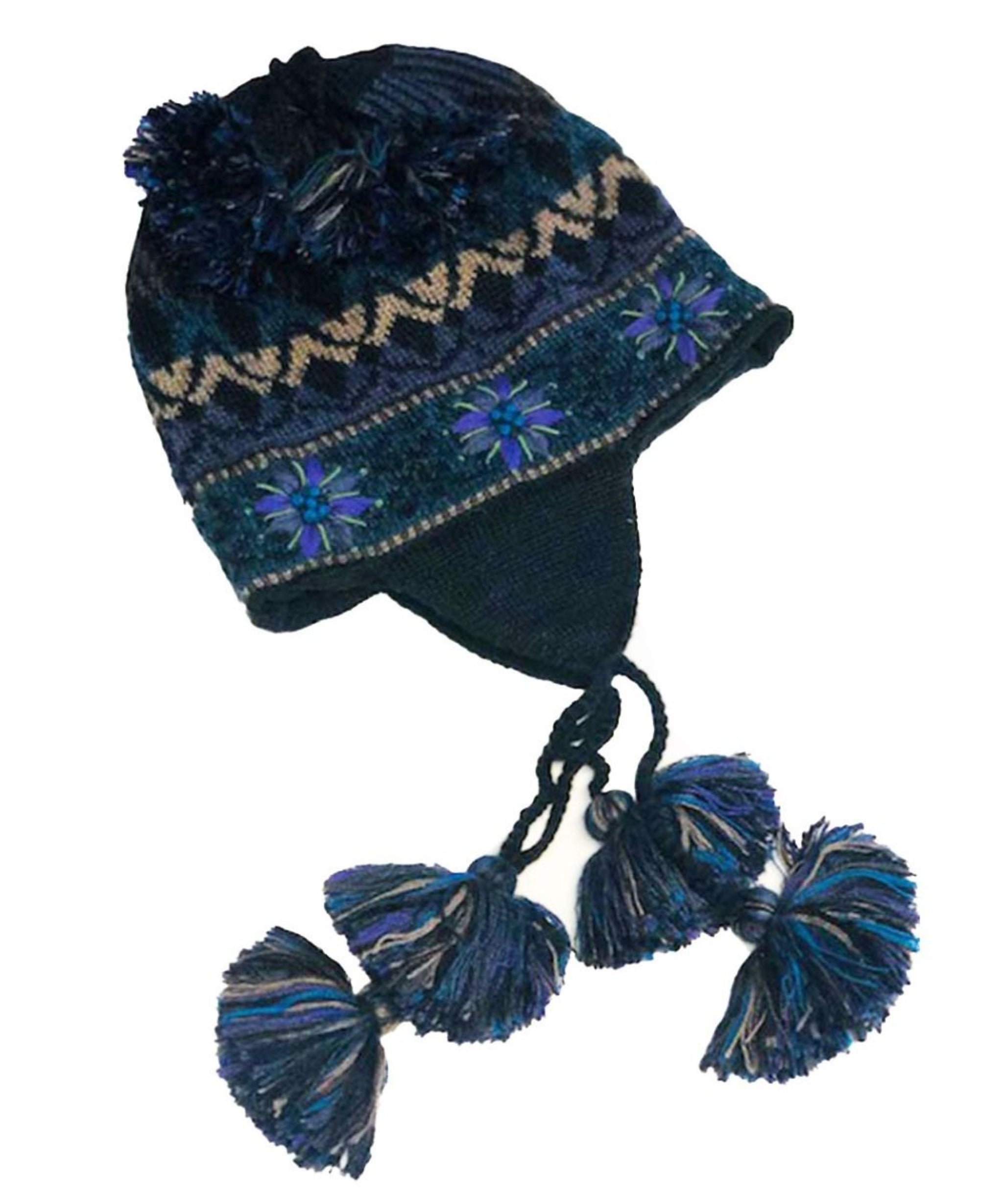 Blue knitted hat with floral patterns and tassels on a white background