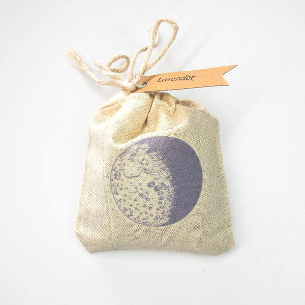 Close-up of an organic linen lavender sachet with dried lavender buds, eco-friendly home freshener