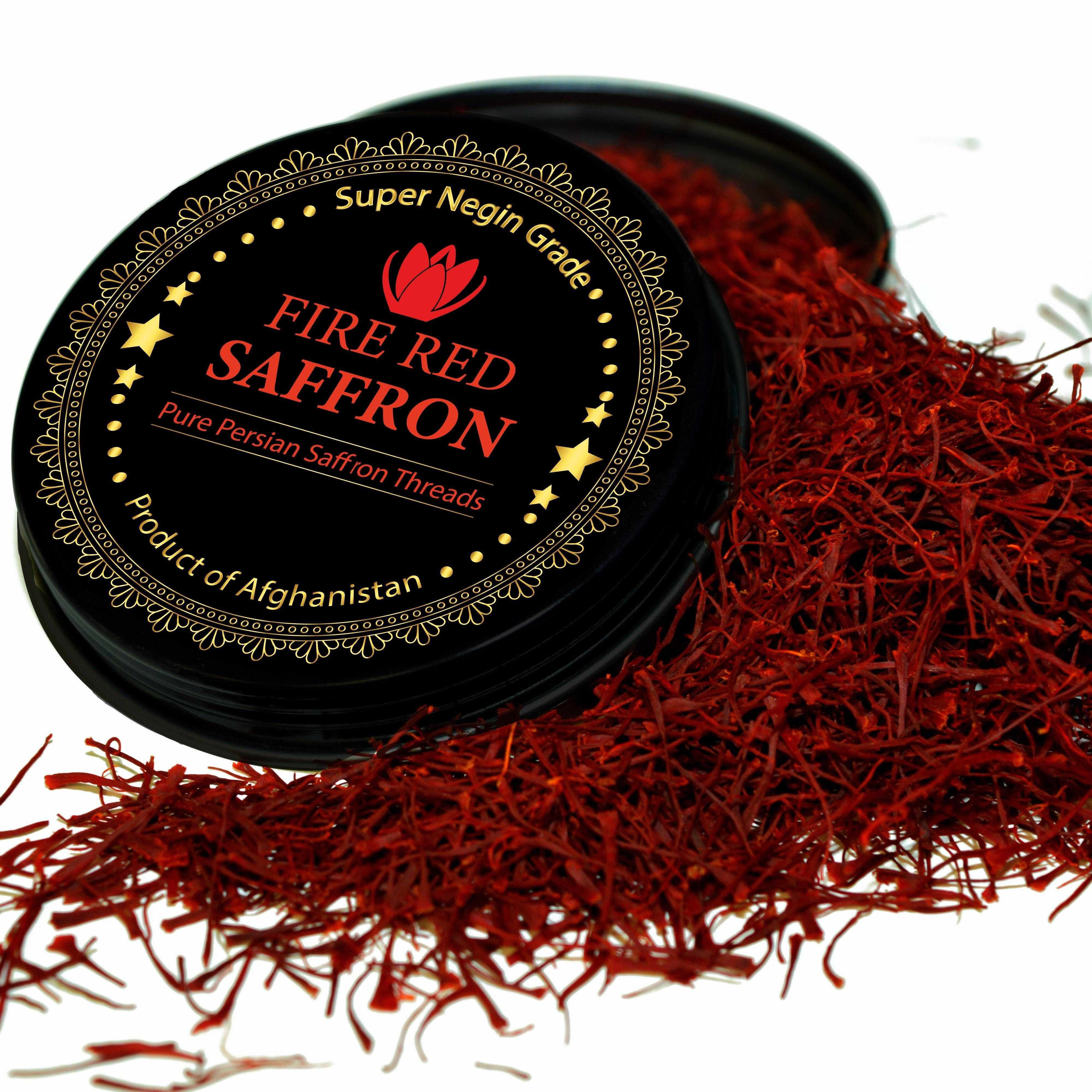 Tin of Premium Super Negin saffron threads shown in a small measured pile