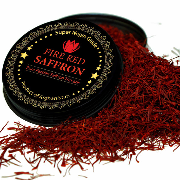 Tin of Premium Super Negin saffron threads shown in a small measured pile