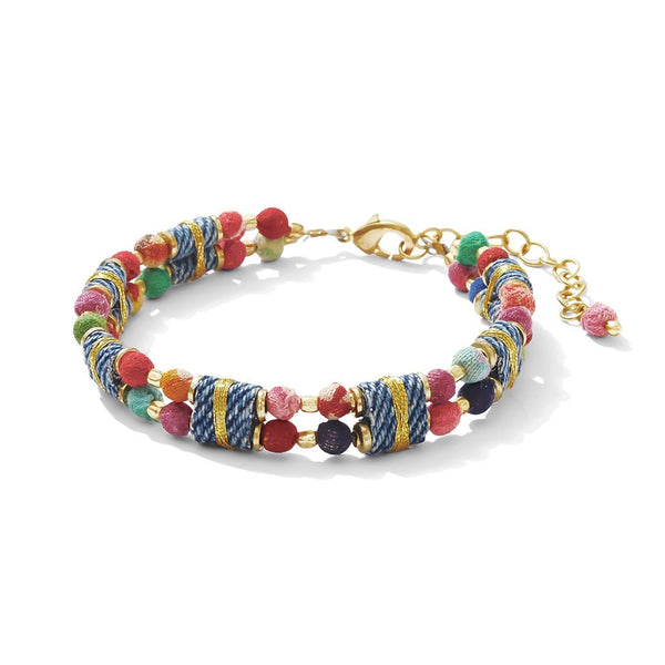 Multicolored beaded bracelet with gold clasp on a white background