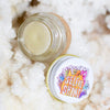 Selfie Shine natural plant makeup balm in a glass jar with metal lid