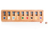 Shut the Box wooden mathematical multi-player game by Kubiya Games on a flat surface