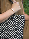 Close-up of Fair Anita brushed silver metal bar cuff bracelet, nickel-free and handmade in India