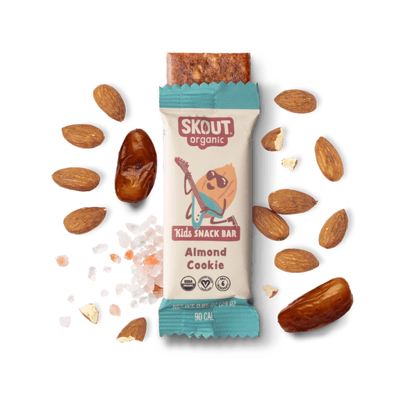 Skout Organic Kids Snack Bar Almond Cookie with almonds and dates on a green background