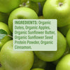 Close-up of green apples with a label detailing ingredients.