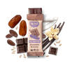 Skout Organic Kids Snack Bar with chocolate, dates, vanilla bean, and nuts on a dark background