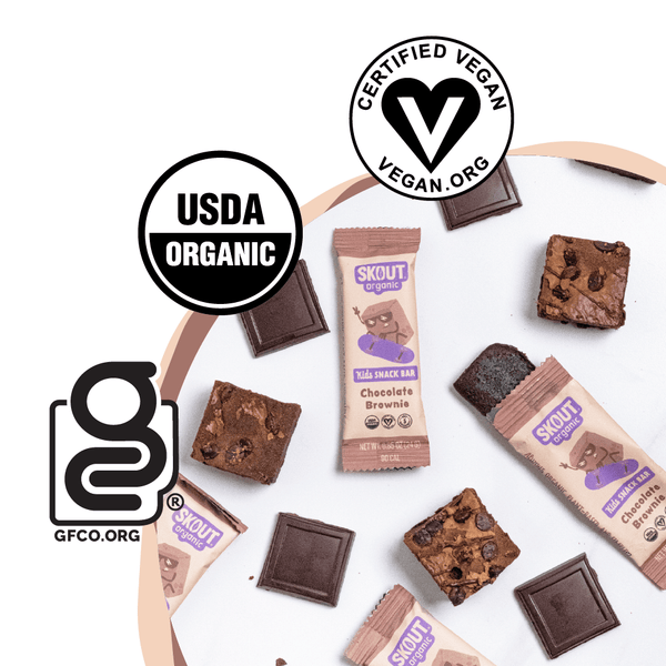 Skout chocolate brownie snack bars with USDA Organic, Certified Vegan, and GFCCO logos on a white background.