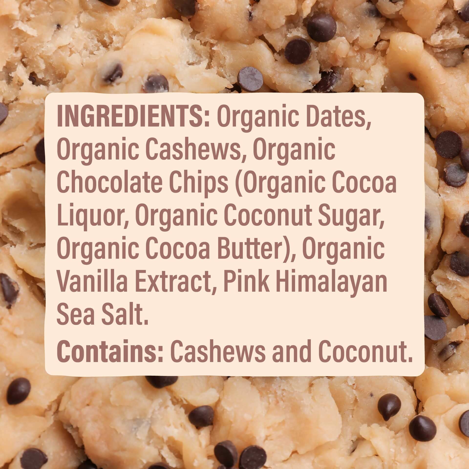 Close-up of a cookie bar with ingredients listed on a white label, surrounded by cookie bars.