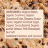 Close-up of a cookie bar with ingredients listed on a white label, surrounded by cookie bars.