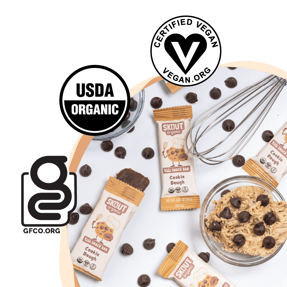 Skout Organic cookie dough bars with chocolate chips and certification logos on a white background